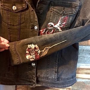 Black denim jacket with artistic details